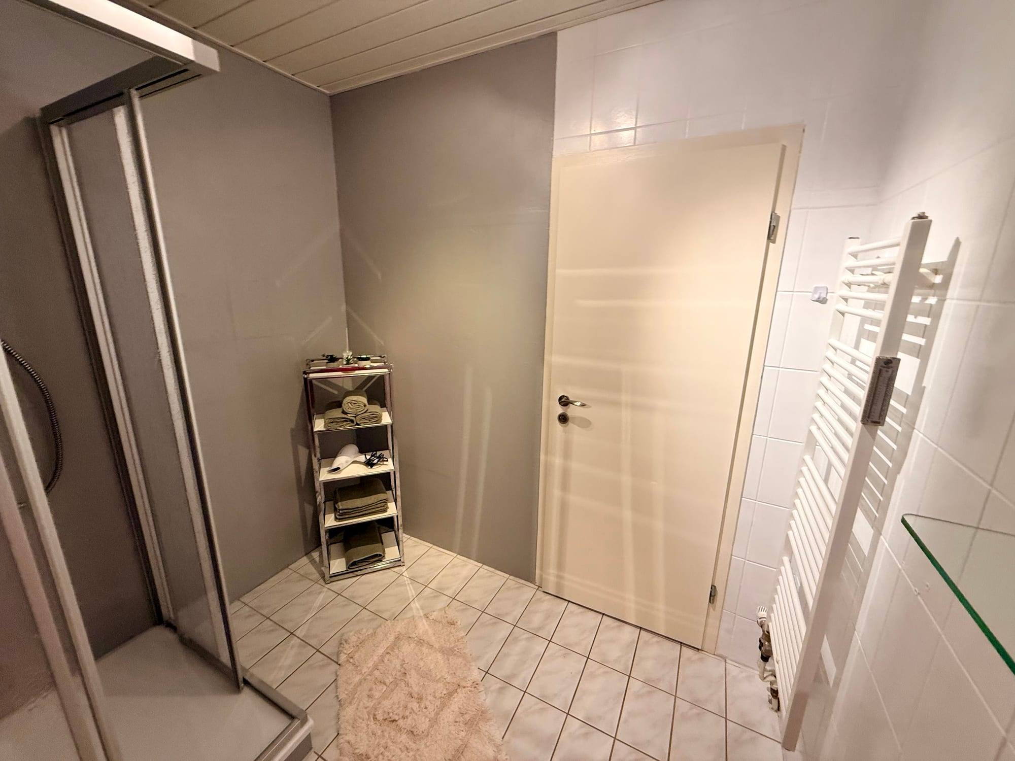 Bathroom with heated towel rail