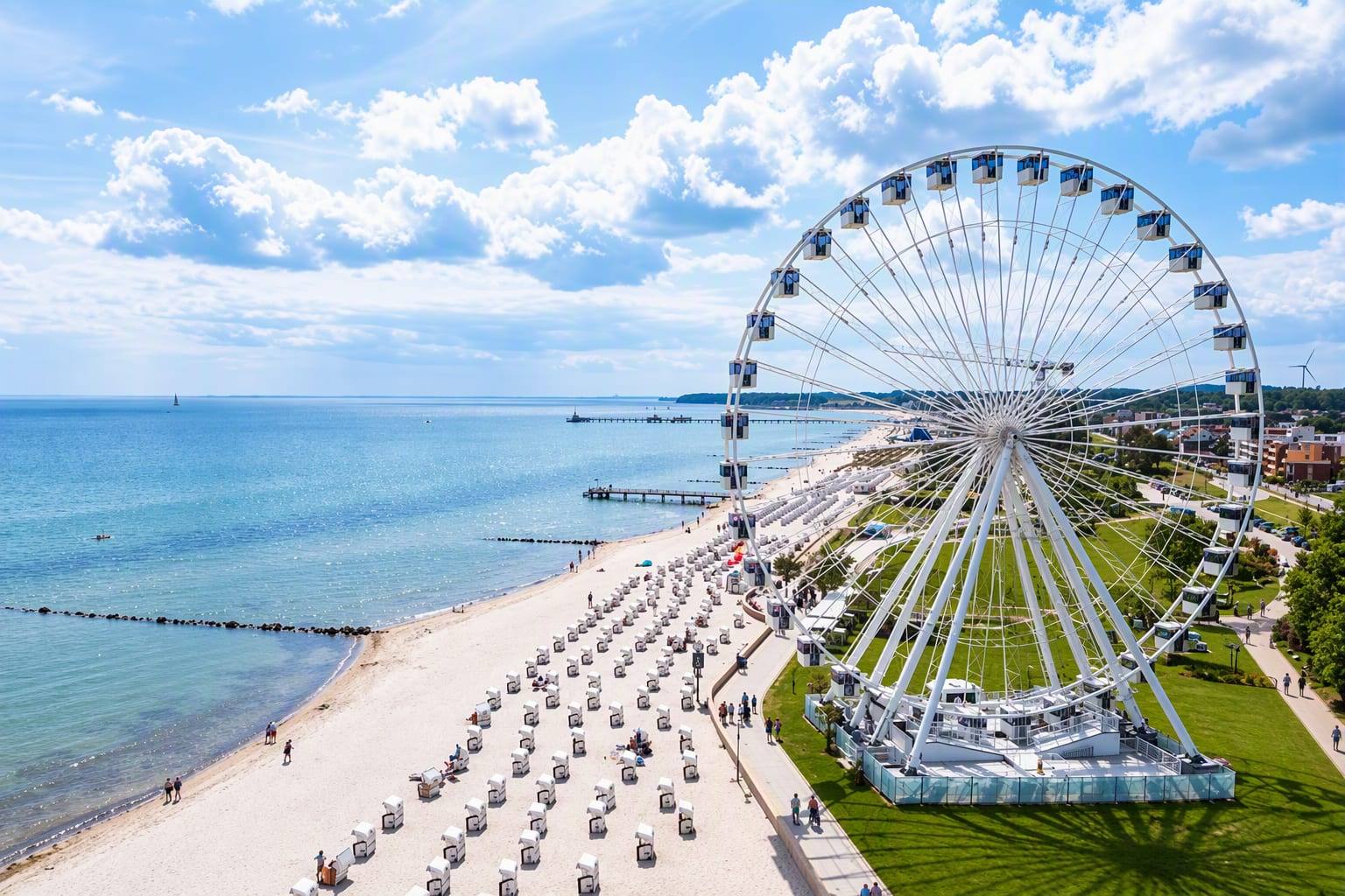 Ferris wheel on the beach promenade overlooking the beach and the Baltic Sea